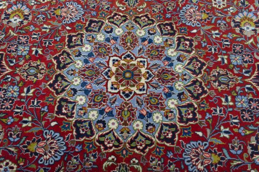 Central medallion detail of 2000s Kashan rug from Iran / Persia