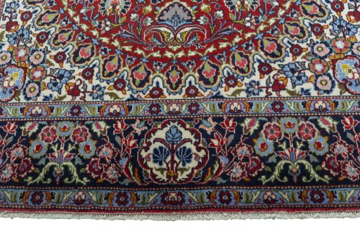 Full view of 2000s Kashan rug from Iran / Persia, 218 × 136 cm in Red tones