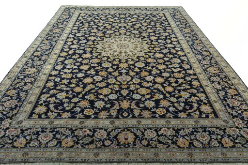 Surface texture of 2000s Kashan rug with natural Wool and intricate pattern
