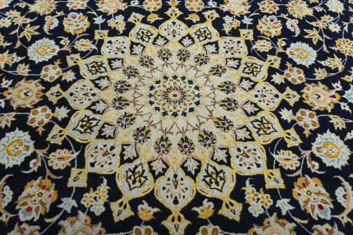 Central medallion detail of 2000s Kashan rug from Iran / Persia