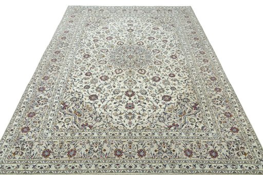 Surface texture of 2000s Kashan rug with natural Wool and intricate pattern