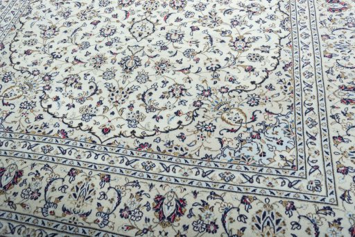 Close-up detail of 2000s Kashan rug from Iran / Persia showing Wool weave