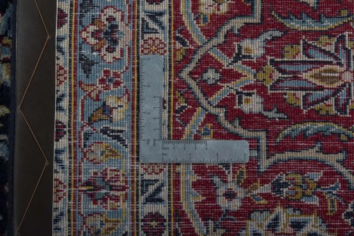 Central medallion detail of 2000s Kashan rug from Iran / Persia