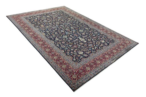 Close-up detail of 2000s Kashan rug from Iran / Persia showing Wool weave
