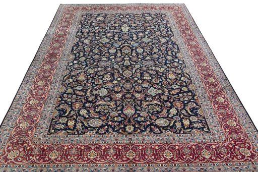 Surface texture of 2000s Kashan rug with natural Wool and intricate pattern