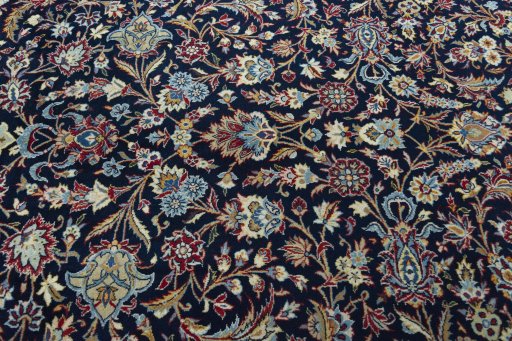 Central medallion detail of 2000s Kashan rug from Iran / Persia