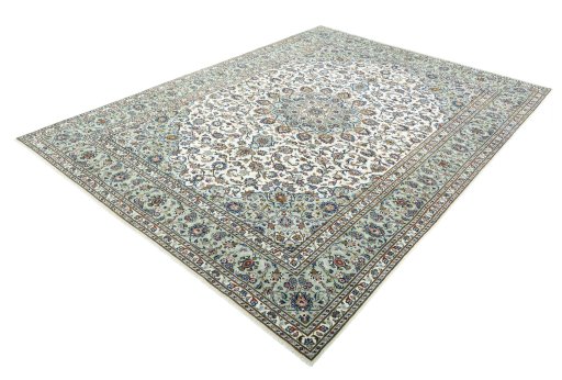 Corner detail of 2000s Kashan rug showing border pattern and Wool pile