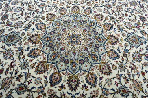 Central medallion detail of 2000s Kashan rug from Iran / Persia