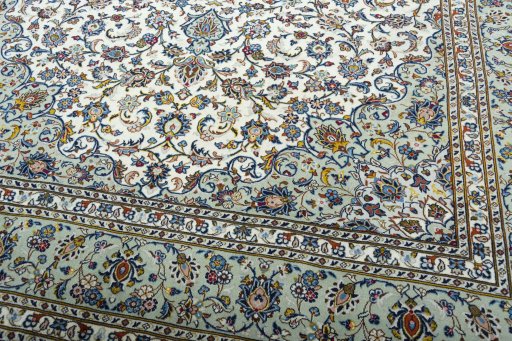 Close-up detail of 2000s Kashan rug from Iran / Persia showing Wool weave