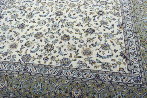 Close-up detail of 2000s Kashan rug from Iran / Persia showing Wool weave