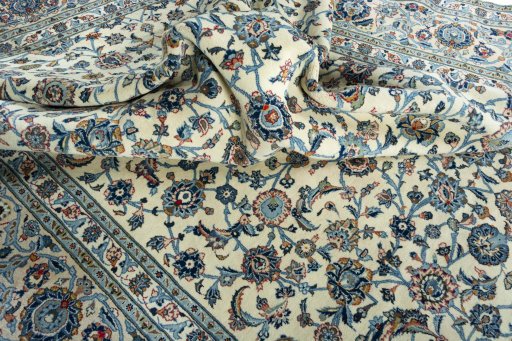 Surface texture of 2000s Kashan rug with natural Wool and intricate pattern