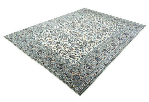 Corner detail of 2000s Kashan rug showing border pattern and Wool pile