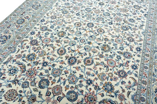 Backside of handmade 2000s Kashan rug showing knot structure and weave density