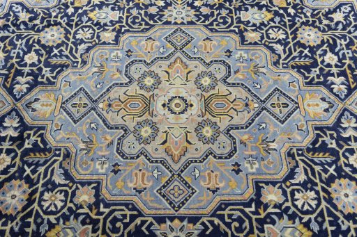 Central medallion detail of 2000s Kashan rug from Iran / Persia