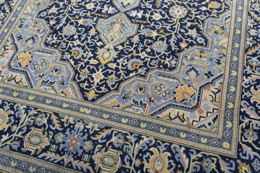 Close-up detail of 2000s Kashan rug from Iran / Persia showing Wool weave