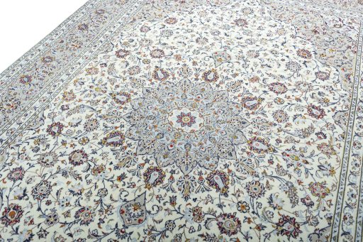 Backside of handmade 2000s Kashan rug showing knot structure and weave density