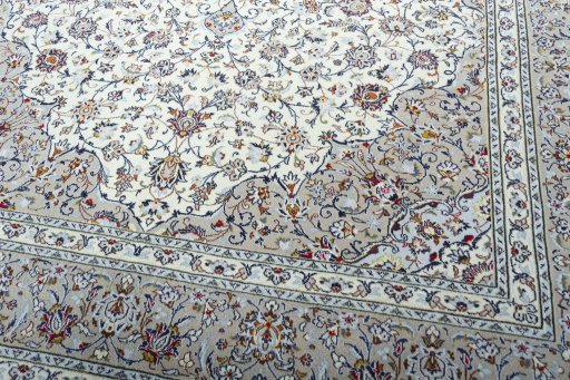 Close-up detail of 2000s Kashan rug from Iran / Persia showing Wool weave
