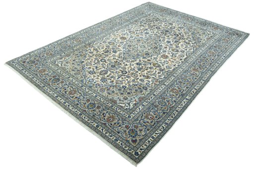 Corner detail of 2000s Kashan rug showing border pattern and Wool pile