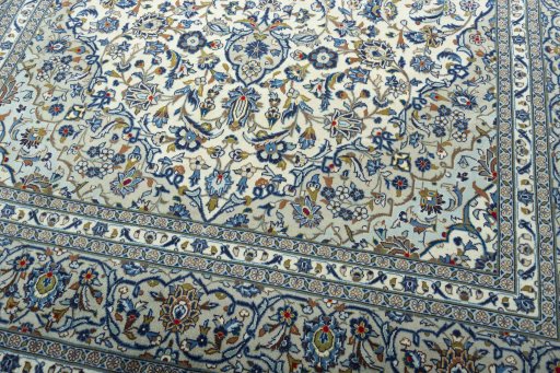 Close-up detail of 2000s Kashan rug from Iran / Persia showing Wool weave