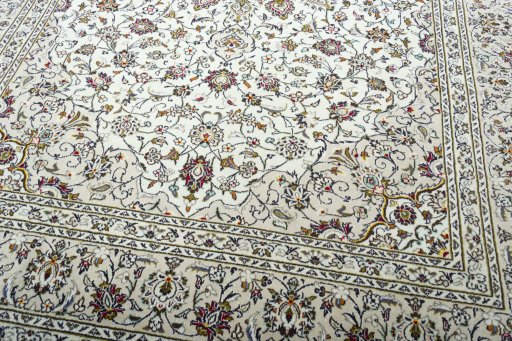 Close-up detail of 2000s Kashan rug from Iran / Persia showing Wool weave