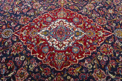 Central medallion detail of 2000s Kashan rug from Iran / Persia