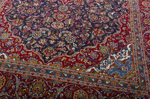 Close-up detail of 2000s Kashan rug from Iran / Persia showing Wool weave