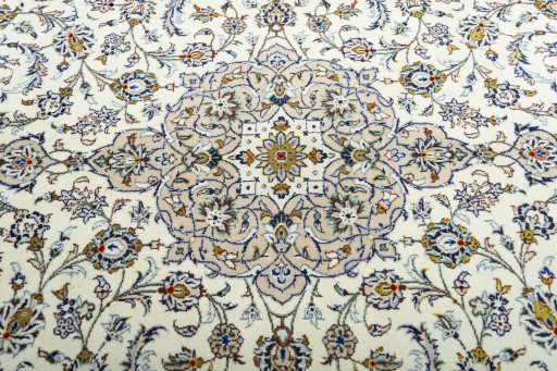 Central medallion detail of 2000s Kashan rug from Iran / Persia