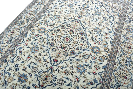 Backside of handmade 2000s Kashan rug showing knot structure and weave density