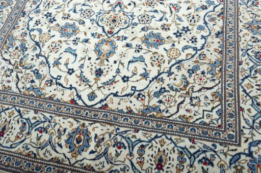 Close-up detail of 2000s Kashan rug from Iran / Persia showing Wool weave