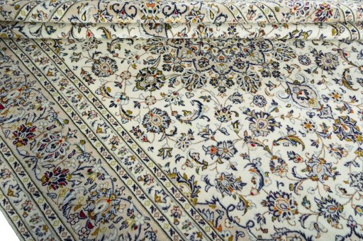 Close-up detail of 2000s Kashan rug from Iran / Persia showing Wool weave