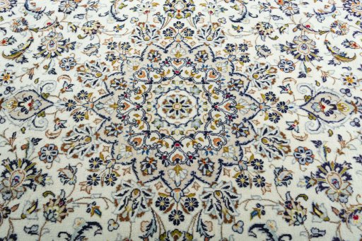 Central medallion detail of 2000s Kashan rug from Iran / Persia