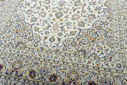 Close-up detail of 2000s Kashan rug from Iran / Persia showing Wool weave