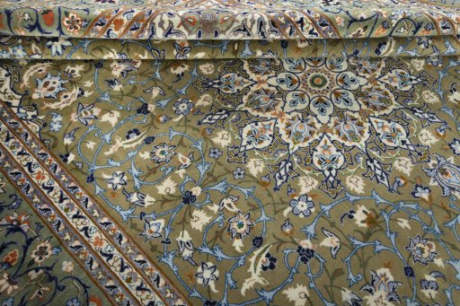 Close-up detail of 2000s Kashan rug from Iran / Persia showing Wool weave