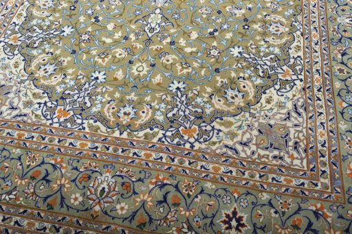 Close-up detail of 2000s Kashan rug from Iran / Persia showing Wool weave