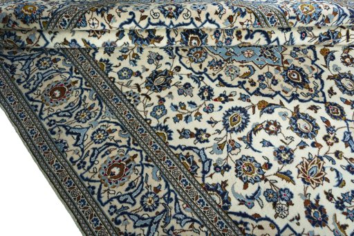 Close-up detail of 2000s Kashan rug from Iran / Persia showing Wool weave