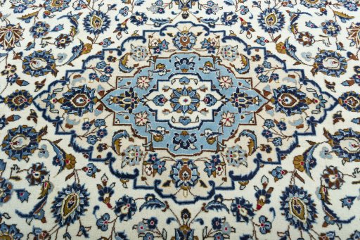 Central medallion detail of 2000s Kashan rug from Iran / Persia