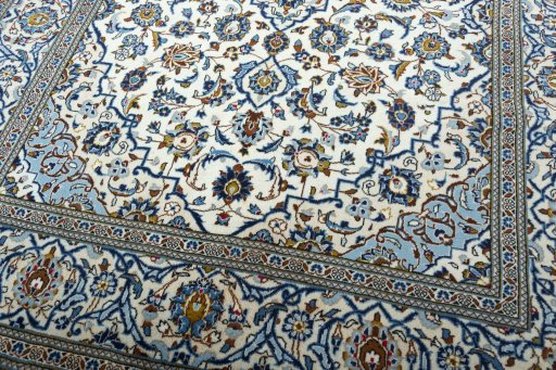 Close-up detail of 2000s Kashan rug from Iran / Persia showing Wool weave