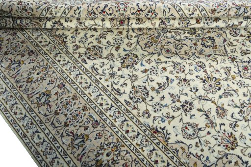 Close-up detail of 2000s Kashan rug from Iran / Persia showing Wool weave
