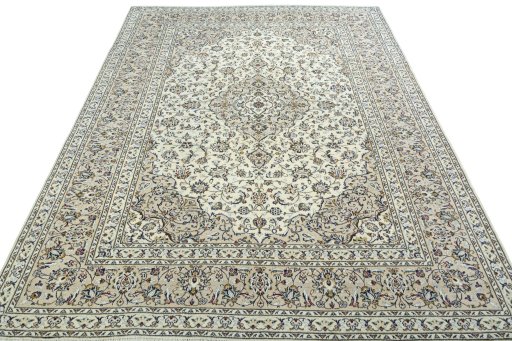 Surface texture of 2000s Kashan rug with natural Wool and intricate pattern