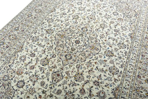 Backside of handmade 2000s Kashan rug showing knot structure and weave density