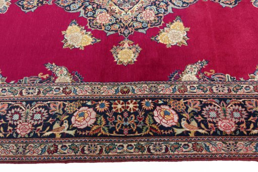 Corner detail of 1930s Kashan rug showing border pattern and Cork pile