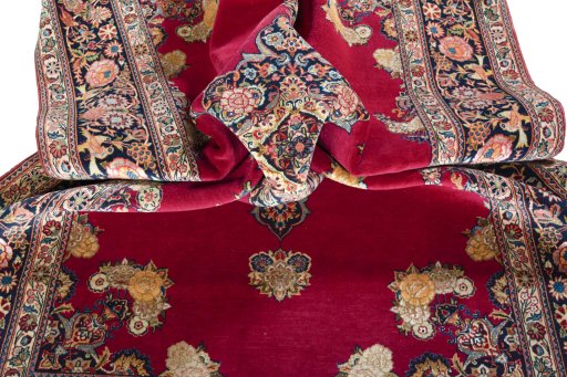 Surface texture of 1930s Kashan rug with natural Cork and intricate pattern