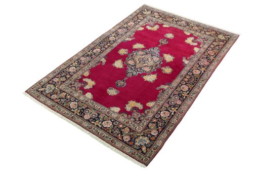 Corner detail of 1930s Kashan rug showing border pattern and Cork pile