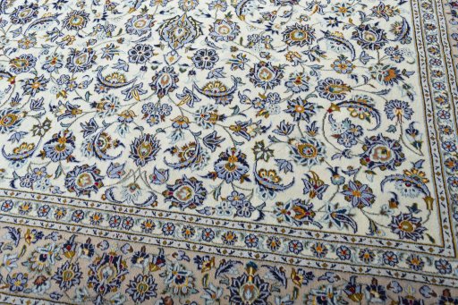Close-up detail of 2000s Kashan rug from Iran / Persia showing Wool weave