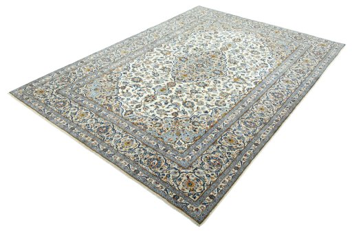 Corner detail of 2000s Kashan rug showing border pattern and Wool pile