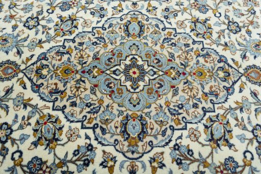 Central medallion detail of 2000s Kashan rug from Iran / Persia