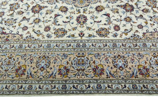 Corner detail of 2000s Kashan rug showing border pattern and Wool pile