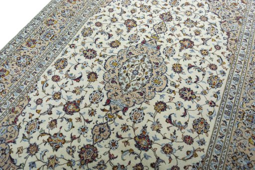 Backside of handmade 2000s Kashan rug showing knot structure and weave density