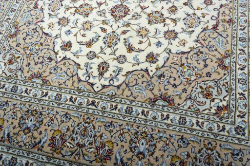 Close-up detail of 2000s Kashan rug from Iran / Persia showing Wool weave