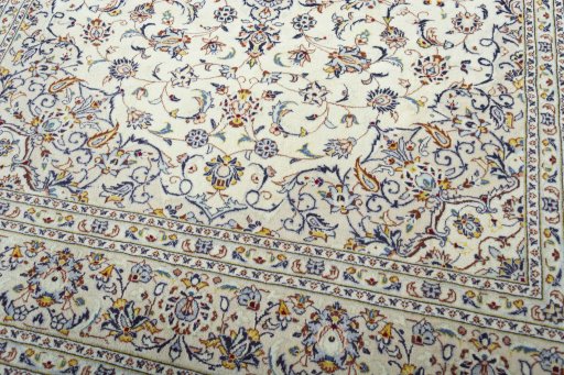 Close-up detail of 2000s Kashan rug from Iran / Persia showing Wool weave